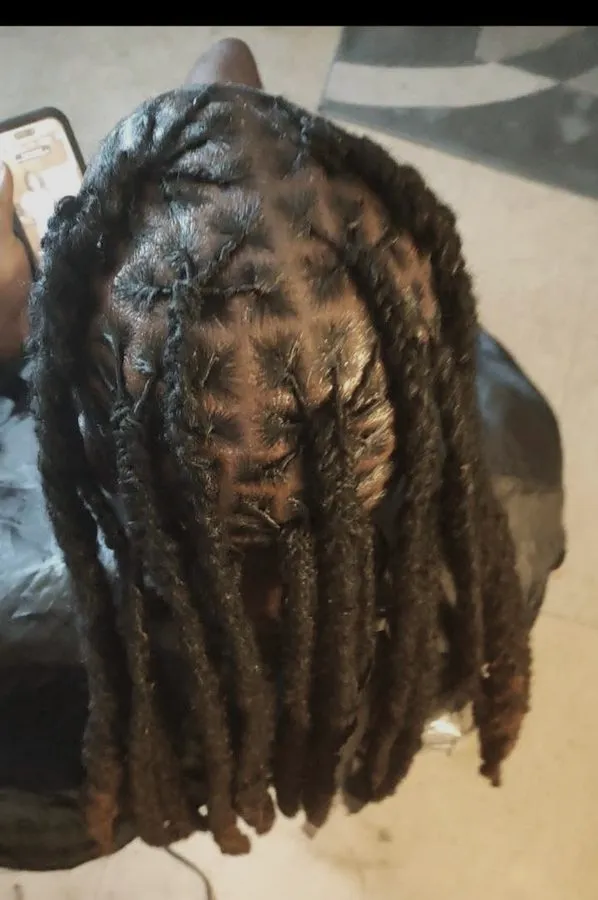 Retwisted locs, shoulder length